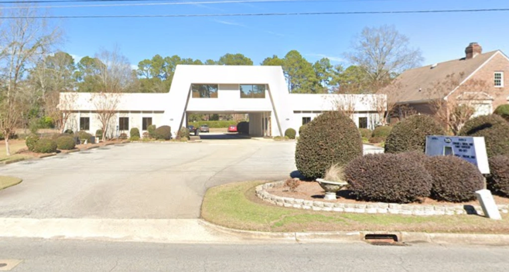 Green and Greene Smiles - The Offices of Dr. Edward Green, DMD and Dr. Erica Greene, DMD - Professional dental clinic exterior with modern facilities