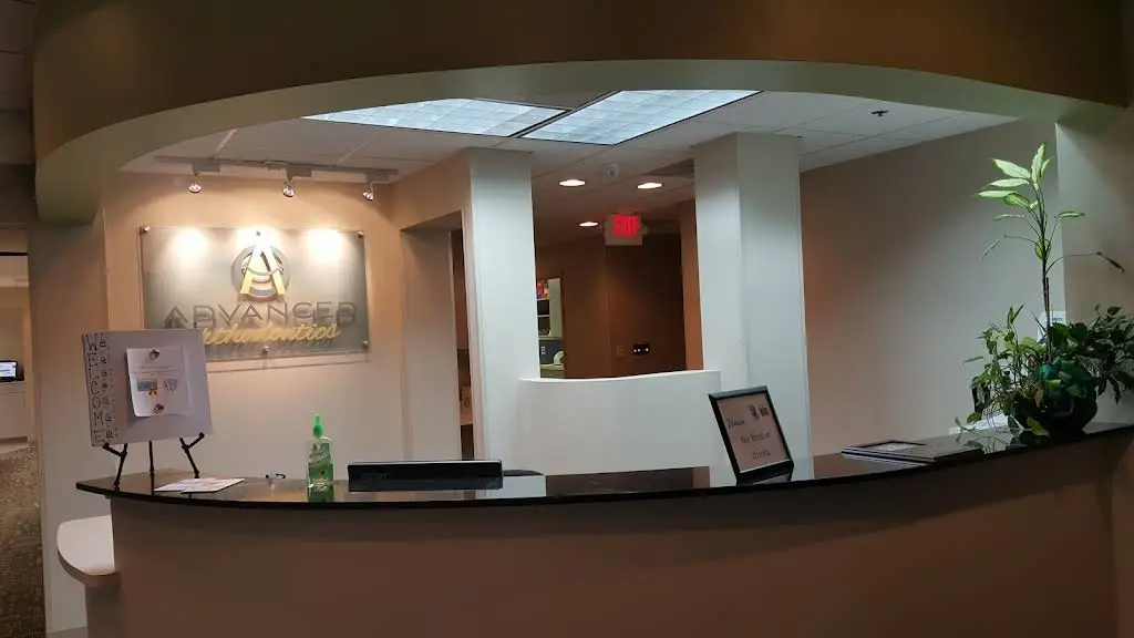 Advanced Orthodontics - Professional dental clinic exterior with modern facilities